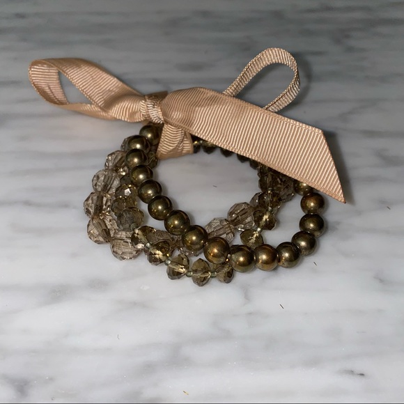 Bundle of six beaded stretchy bracelets. Silver/ clear and Gold/ Bronze - Picture 4 of 6